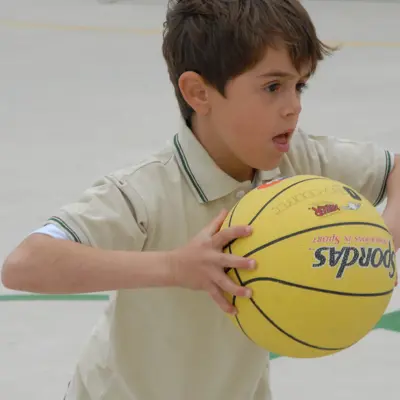 kid holding a basketball