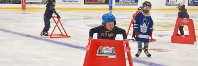 young child ice skating