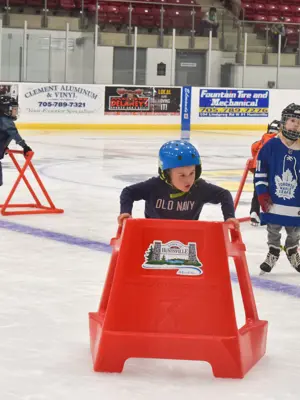 young child ice skating